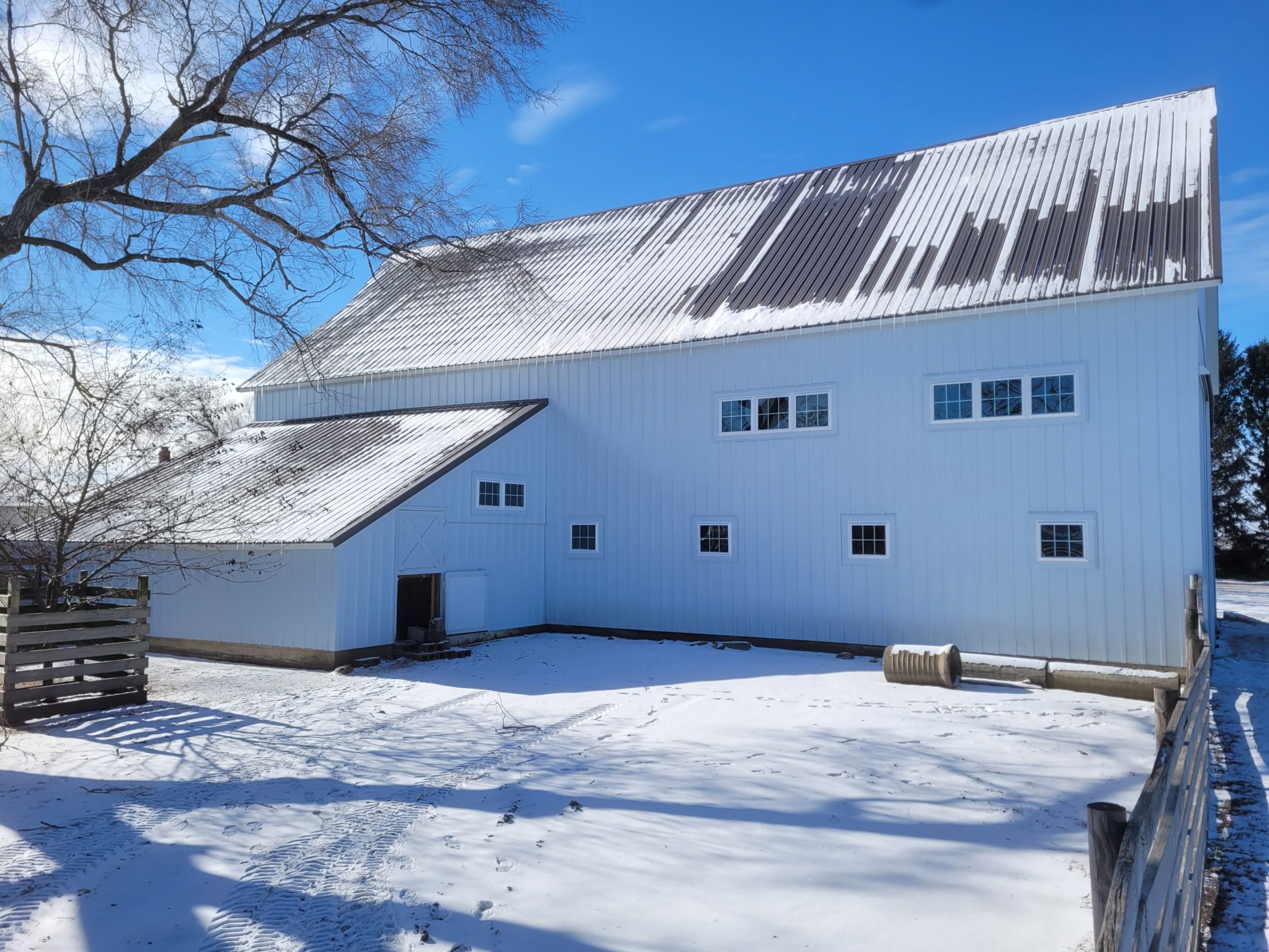 Horse Barn Restoration with Board and Batten Steel Siding